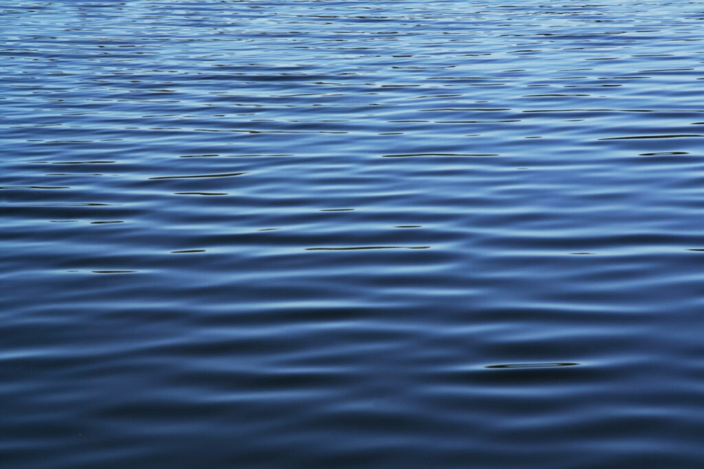 Soft blue waves - water surface on sea